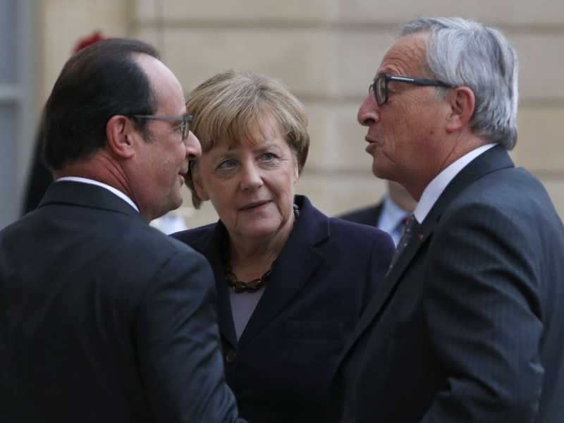 Hollande, Merkel e Juncker (foto LaPresse)
