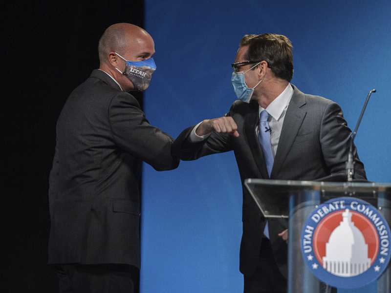 Spencer Cox e Chris Peterson (Trent Nelson/The Salt Lake Tribune, via AP, Pool)&nbsp;<br />