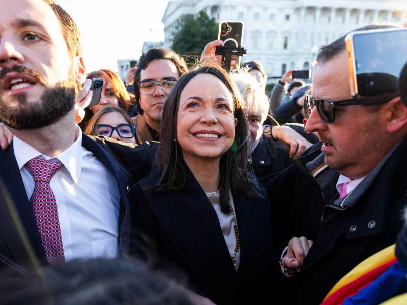 epa12652334 Venezuelan opposition leader Maria Corina Machado (C) is greeted by supporters after meeting with a bipartisan group of Senators in the US Capitol in Washington, DC, USA, 15 January 2026. Earlier in the day, Machado met with US President Donald Trump.  EPA/JIM LO SCALZO