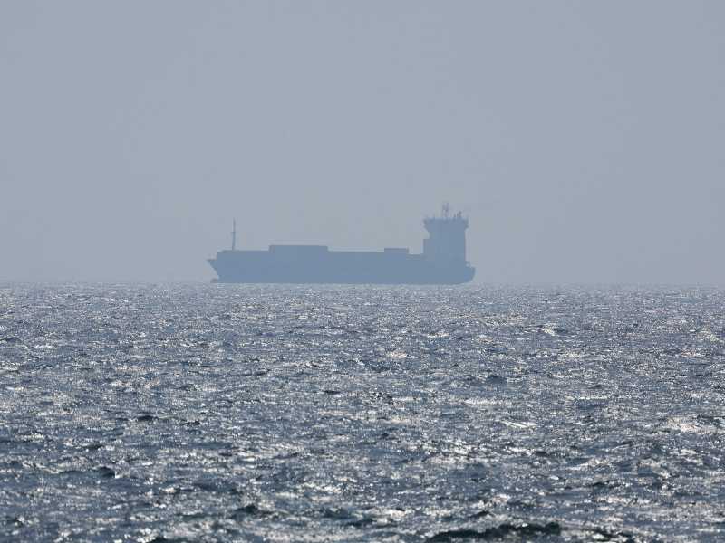 epa12192585 A container ship sails on the Strait of Hormuz, as seen from Ras Al Khaimah, United Arab Emirates, 23 June 2025. The Strait lies between Oman and Iran and links the Gulf to the Arabian Sea. The Iranian parliament approved a measure to close the Strait of Hormuz, following US strikes on three of Iran's key nuclear sites on 22 June 2025. Israel and Iran have been exchanging fire since Israel launched strikes across Iran on 13 June 2025.  EPA/ALI HAIDER